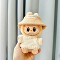 Labubu doll accessory featuring a beige bucket hat and a white knitted sweater - White Sweater With Keychain + Small Bunny Hat / First And Second Generation Keychains Are Compatible With La Cloth Dolls. Dolls Not Included.