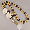 Handmade woven crossbody phone lanyard with black, white and yellow daisy flower pattern - Black Orange White Woven Daisy