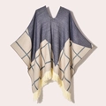 Blue and beige geometric knit poncho with tassel trim and V-neckline flat lay - 130x150cm / Pullover Five Star Plaid Navy Blue