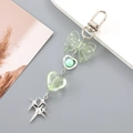 Dettaglio del fiocco in acrilico verde, cornice a cuore con perline e stelle - Pendaglio Stella Con Fiocco (K4848) / Verde (K4848)