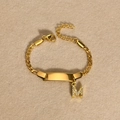 Gold stainless steel Figaro bracelet with polished bar and zircon initial M pendant - Gold Letter M