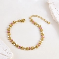 Detail of leaf-shaped gold bracelet with white and pink enamel and adjustable chain - Pink & White