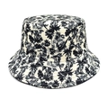 Vue détaillée de l'imprimé palmier tropical sur un bob en toile de couleur beige - M (56-58cm) / Noir