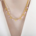Elegant gold-tone star necklace with pink star pendants worn by a female model - Necklace (P1499) / 40+5cm / Purple