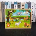 Educational wooden peg puzzle featuring forest animals like elephants and giraffes - A012 Forest Animals Recognition