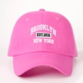 Close-up of Brooklyn New York 3D embroidery on bright pink cotton baseball cap - One Size / Hot Pink