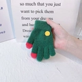 Detail of green knit children's warm gloves with red fingertips and yellow smiley patch - Dark Green