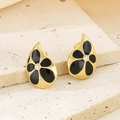 Detailed macro view of 18K gold petal earrings with black enamel and tiny center zircon - Gold Black Enamel Style (KE115081-K)