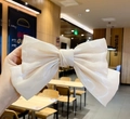 Oversized champagne beige bow hair clip in shimmering translucent organza fabric - Off-White Iridescent Bow Clip
