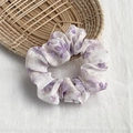 Floral chiffon scrunchie with purple flower patterns on a clean white fabric background - Purple Flower