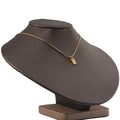 Detailed view of a gold square pendant necklace on a jewelry neck display stand - Gold Color (1 Pendant)