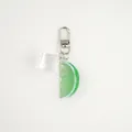 Detailed close-up of a realistic lime slice and resin ice cube charm with silver lobster clasp - No.3-Lime Slice with D-Hook