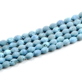 Macro shot of light blue druzy agate beads with natural porous texture for DIY jewelry - Sky Blue