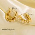 Gold asymmetrical pearl hoop earrings with irregular design and silk background - Irregular Ring with Pearls