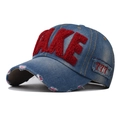 Close-up of vintage washed blue denim baseball cap with 3D red FAKE plush embroidery - Adjustable / Burgundy