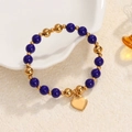 Navy blue natural stone and gold bead elastic bracelet with a golden heart charm - Dark Blue Beads-Gold Heart Charm