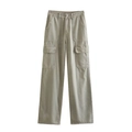 Close-up of olive green cargo pants featuring cotton twill texture and side pockets - Light Gray