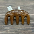 Detail of sandalwood massage comb with five teeth and embossed auspicious clouds patterns - Golden Sandalwood 'Fu' Character Carving (9.5*5.7*2cm)