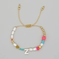 Handmade braided evil eye bracelet with white baroque pearl and letter Z charm - Letter Z Style (ZZ-B24061901Z-F)