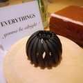 Matte black bird nest expandable hair claw clip for ponytail holders on wood base - Matte Black