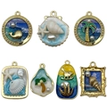 Blue ocean style alloy enamel pendants set with whale and starfish designs for DIY jewelry - Mix 7 Pcs Oil Drip Ocean Series-SN1386