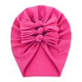 Detail of soft rose pink baby turban hat with triple-layered bow and knit texture - Rose Red