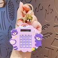Pink cloud-shaped calculator keychain featuring a purple cartoon bear and golden bell - Hugging Heart Bear Computer - Purple