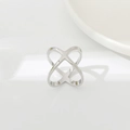 Polished silver cross ring with X-shaped design on a white ceramic plate - BZ051-3 Large Silver X-Shape Cross