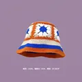 Handmade crochet bucket hat with orange floral patterns and boho stripes on purple background - M (56-58cm) / Contrast Striped Sunflower Hat Orange