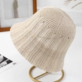 Minimalist beige hollow knit bucket hat with bow detail on a stylish display stand - M(56-58cm) / Beige
