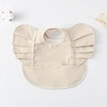 Beige baby bib with ruffles and large pocket for catching food crumbs on white background - Wings - Solid Beige / One Size