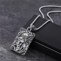 Silver Cuban chain with embossed ancient warrior pendant on dark background - Warrior Relief Pendant