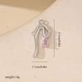Macro de pendentif nœud argenté avec zircon rose et détails de dimensions précis - Or Blanc + Zircone Rose