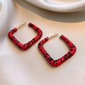 Detail of square hoop earrings with leopard stripe texture on beige silk background - Striped Woven Square Hoop Style (143#) / Red & Black