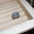 Close-up of sparkling silver hollow cage ring with clear zircon stones on velvet - Silver Wide Hollow Style