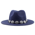 Detailed view of dark blue woven straw fedora hat with bohemian silver sunburst metal band - Navy Blue