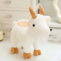 Cute realistic white plush goat stuffed animal toy with brown horns in a standing pose - Aries