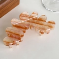 French acetate hair claw clip in caramel cream swirl pattern with fine glitter finish - Orange Stripe