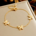 Golden butterfly necklace with shell pendants on an elegant display stand - Double-Layer Butterfly Enamel Bracelet (B1508)