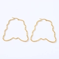 Exaggerated geometric wavy hoop earrings in polished gold stainless steel on white back - Butterfly (Gold)