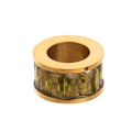 Detail of a gold cylinder pendant with an inlaid rectangular yellow gemstone accent - Yellow Ring