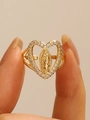Adjustable gold Virgin Mary ring featuring a heart frame with sparkling white crystals - Middle KC Gold (9546)