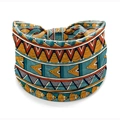 Elastic wide headband with orange and teal African geometric print on white background - Style 62