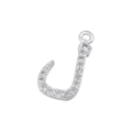 Macro shot of silver letter J pendant with cubic zirconia inlay on white background - White Gold 05