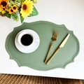 Green oval faux leather placemat with vintage embossed texture and heat resistance - Bean Green Faux Leather Vintage Oval