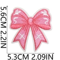 Patch ricamata a farfalla rosa con dimensioni 5,6 cm x 5,3 cm su sfondo bianco neutro - N. 1 Fiocco Rosa