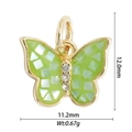 Macro view of gold butterfly pendant with green mosaic inlay and zircon accents - Green Mosaic Butterfly (DZ-1764)