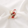 Christmas brooch featuring a skiing Santa Claus with golden gift bag and rhinestones - Skiing Santa