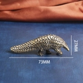 Miniature brass pangolin figurine with detailed scales, dimensions 73mm x 27mm - Pangolin (Large)