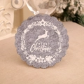 Detail of grey felt Christmas coaster with white reindeer wreath on a beige cloth - Elk / Gray